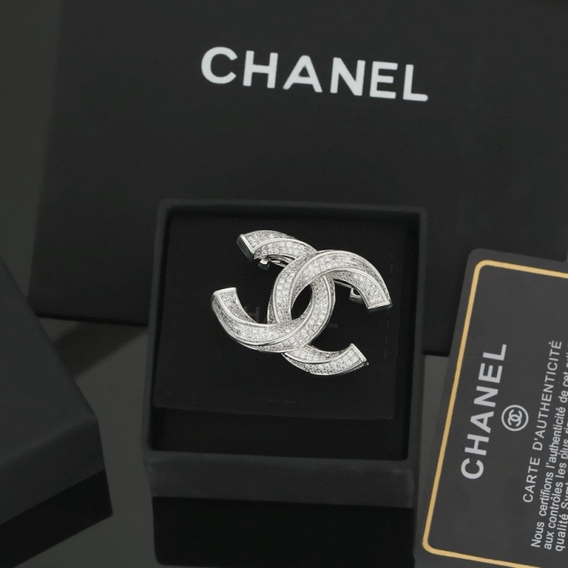 Ch*el brooches